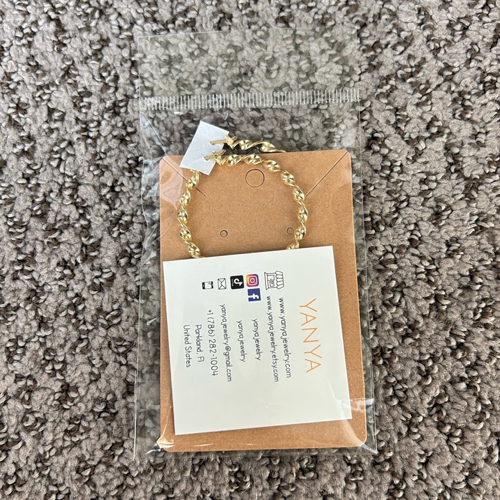 Gold twisted hoops